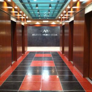 The NewsroomElevator BayFaux painted floor Faux Granite Backing wall and Stained Walls