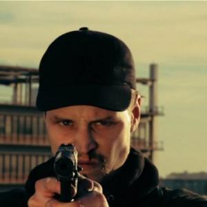 Keith Staley as Russian Assassin, Brief Case