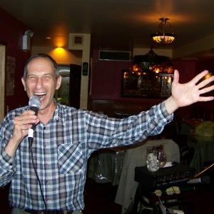 (date posted). Phillip W. Weiss singing at a restaurant in New York City, May 2009.