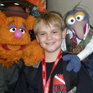 Reese Hartwig with Disneys The Muppets and Ken Jeong