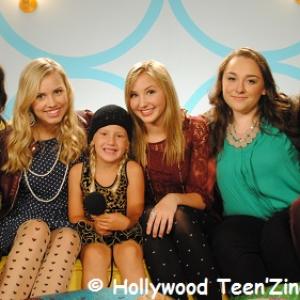 Natalia Stoa in Ooh! LaLa! Couture on set with the cast of IMO on AwesomenessTV! The IMO cast includes Bethany Mota Gracie Dzienny Audrey Whitby Meaghan Dowling and Teala Dunn
