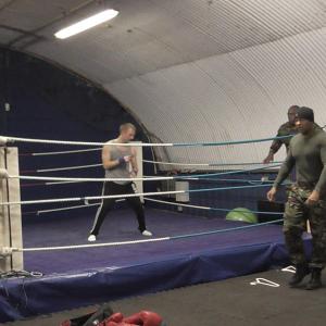 Martin J Thomas far right fight training on the Set of Service Man