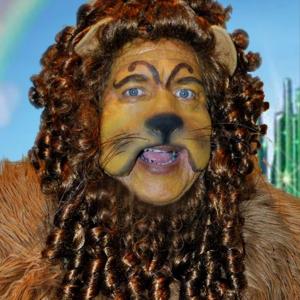 Michael Carnegie as The Cowardly Lion in the stage production of The Wizard of Oz