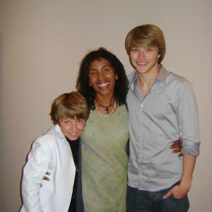 Austin on the set of Elle: A Modern Cinderella Tale with his manager, Tina Treadwell and Sterling Knight