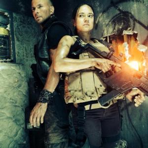 Luciana Faulhaber as Rose and Luke Goss as Wade in The NIght Crew