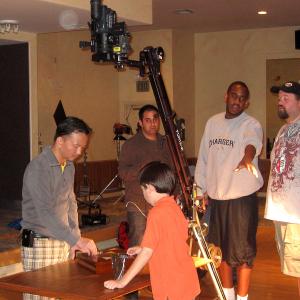 Kevin Trang on set with director Brook Chalmers of 