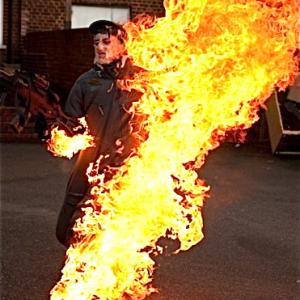 Tom Cheshire Performing Full Body Burn