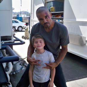 Having fun in between filming is Criminal Minds Star Shemar Moore with Criminal Minds Guest-Star Stone Eisenmann playing Young Flynn (a younger version of Tim Curry's role)