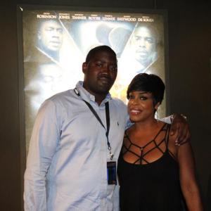 Oliver W. Ottley III with Niecy Nash at the 2014 American Black Film Festival.