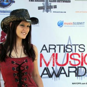 Best Country Western SingerSongwriter and 2014 Artists In Music Awards nominee on the red carpet at a celebrity charity benefit in Hollywood CA