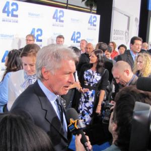 Harrison Ford talk to the media on premiere night for Warner Bros Legendary Pictures Production of 42 the true story about Jackie Robinson starring Cadwick Boseman