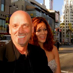 Director Martin Campbell with Actress wife and singer Sol Romero signing autographs at the Hollywood Premiere of Warner Bros Green Lantern See slide show  wwwMAYOPRcom