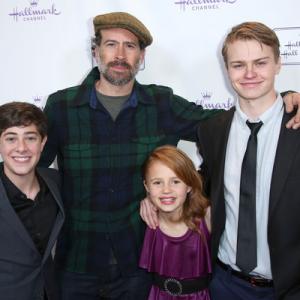 Jaren Lewison with Jason Lee Maggie Elizabeth Jones and Connor Paton on the red carpet at the premiere of Hallmark Hall of Fames Away and Back
