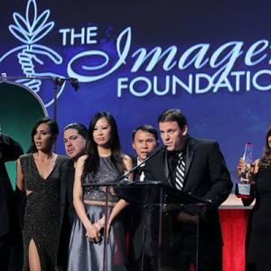 The cast of Caribe Road accepting the award at The 28th Annual Imagen Awards