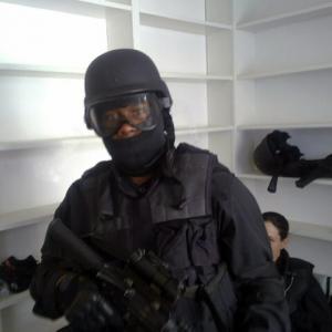Cedric Burton on SWAT Team. Movie: Colombiana (2011)