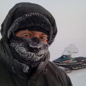 Sergio Olivares staying warm in Canadian North.