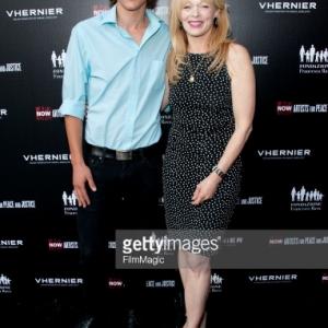 Josiah Lipscomb (L) and actress Frances Fisher arrive at the Artists for Peace and Justice 'A Ring to Educate a Child in Haiti' launch event at Vhernier Beverly Hills on June 15, 2011 in Beverly Hills, California