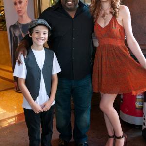 Serena Laurel with Cedric the Entertainer and Actor, Hunter Payton arriving at Art Hearts Fashion Week.