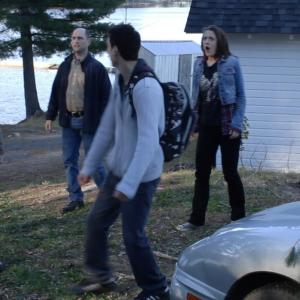 Les, Charles, Dan and Cheyna are confronted by the entity.