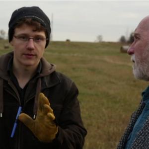 Director Justin Brunelle with actor Paul Boultbee on the set of Under the Acorn Tree