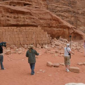 On location for Footsteps in Arabia at the ruins of Lawrence of Arabias house Wadi Rum Desert Jordan