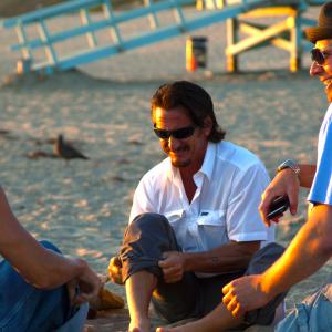 Director Jameson Stafford goes over the beach scene with Sean Penn & Kid Rock while shooting 