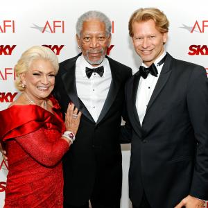 Marcello Coltro and his special guest Hebe Camargo meet with Morgan Freeman at the 39th AFI Life Achievement Award in Los Angeles