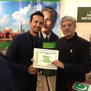 Ali Kazmi Being Awarded a Certificate of recognition for promoting Pakistani culture in Canada at the Pakistan consulate of Toronto