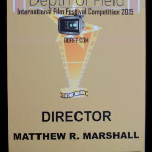 Matthew Marshall won an Award of Merit: Director from Depth of Field International Film Festival Competition 2015. It was one of four awards his film Daughter of the King won from this festival.
