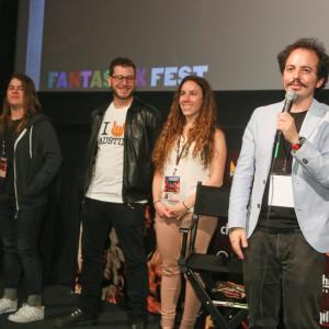 Isaac Ezban with producers Miriam Mercado and Victor Shuchleib and assistant director Stephanie Beauchef at the world premiere of THE SIMILARS at Fantastic Fest Sept 2015 Austin Texas
