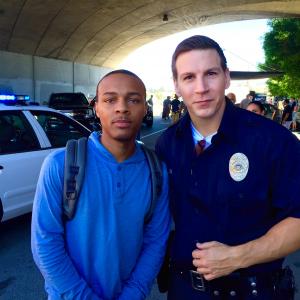 Jonathan Stanley as Officer Brubaker and Shad Moss on the set of CSI Cyber