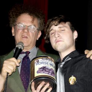 Adam W John C Reilly accepting award from a video contest for Season 3 of the premiere of Adult Swims Check it out With dr Steve Brule