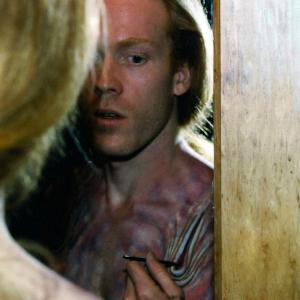 Heath applying prosthetic makeup for a scene in Vancouver Vagabond.
