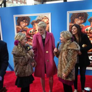 Hannah Loesch and her twin sister Cailin interviewing Emma Stone at the NYC premiere of The Croods