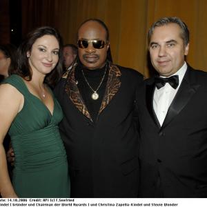 Stevie Wonder with Georg Kindel and his wife Christina at the WOMEN'S WORLD AWARDS in New York City, produced by John Cossette and Georg Kindel