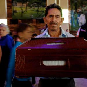 Colombia- one man finally gets to bury his son.