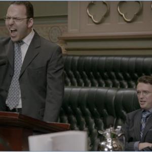 Resign! Resign! Resign!  Rake Season 2 Episode 1  R vs Mohammed Vladimir Lasky plays the leader of the opposition in NSW Parliament In this scene he is shouting at the Premier Toni Collette to resign in the wake of her sex scandal