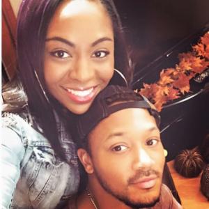 Tequilla Whitfield and Romeo Miller on set of The Royal Thanksgiving for TVone