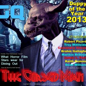 Parody of magazine cover featuring The Cursed Man, Duppy of the Year 2013. The first horror movie monster with a eye for fashion and color coordination