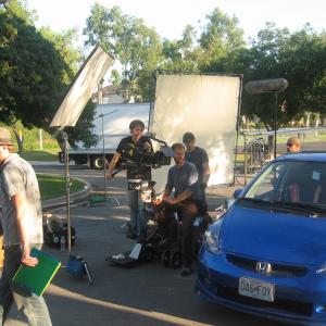 Brenden Miranda getting ready to shoot a chase scene from the film Baby Bear Hes in the back seat