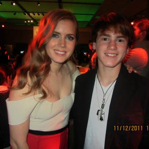 Justin Tinucci with Amy Adams at the premiere of The Muppets November 12 2011 at the El Capitan Theatre, Hollywood.