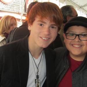 Justin Tinucci with Rico Rodriguez at the premiere of The Muppets November 12 2011 at the El Capitan Theatre Hollywood
