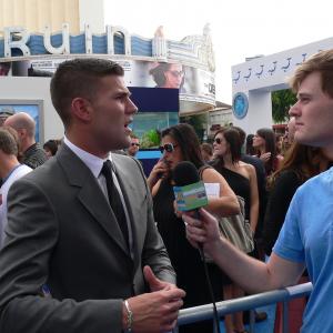 Nathan interviewing actor Austin Stowell on the Red Carpet of Dolphin Tale