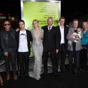 James Landry Hebert poses for a photo with Christopher Walken Sam Rockwell Tom Waits  the rest of the cast of Seven Psychopaths at the LA premiere