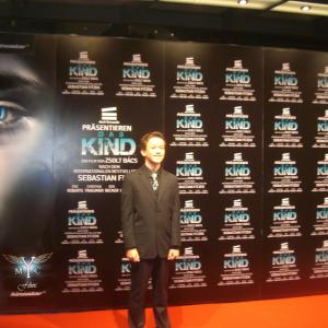 actor Christian Traeumer on the red carpet for the premier of 