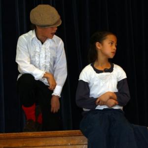 Christian Traeumer and Ella Ngyun as Petruccio and Kate performing the Taming of the Shrew 2009