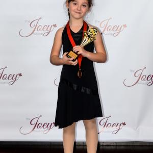 Cadence with her 2014 Joey Award for her lead performance in Florence and the Fish