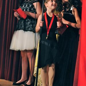 Cadence accepting the 2014 Joey Award for her performance in Florence and the Fish