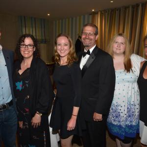CEO and Founder of IMDB Col Needham Karen Needham Natasha Bishop writer Kevin Simanton and Head of PR and Marketing for IMDb Emily Glassman attend IMDbs 2014 Cannes Film Festival Dinner Party at Restaurant Mantel on May 19 2014 in Cannes France