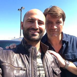 Mo Darwiche and Nathan Fillion on the set of Castle